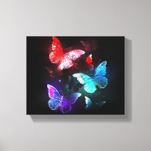 Drie golvende Butterflies op nachtachtergrond Canvas Afdruk