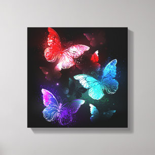 Drie golvende Butterflies op nachtachtergrond Canvas Afdruk
