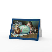 Drie katten en een groot blauw paasei