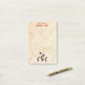 Drie Kokopelli speelt de flank Post-it® Notes (Op bureau)