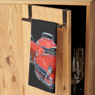 drie koolzure rode en witte vintageauto's, theedoek