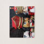 Drie nootmuskers op donkere achtergrond legpuzzel (Verticaal)