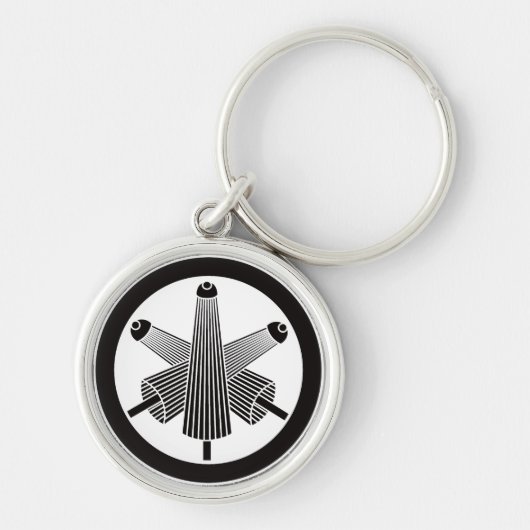Drie paraplu's, verspringend in een cirkel sleutelhanger (Voorkant)
