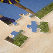 Drie vrouw cheerleaders bezig met formatie legpuzzel (Zijkant)