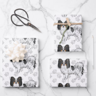 Driekleurige Papillon Cartoonhonden Met Een Pootpa Inpakpapier Vel