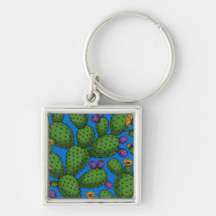 Drijvende opuntia op blauw sleutelhanger