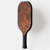 Droge, gebarsten grond pickleball paddle (Links)