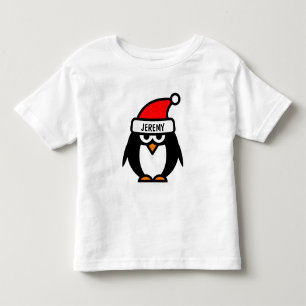 Drôle dessin de manchot de Noël T-shirts pour en