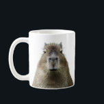 Drôle et mignonne expression de la mug de capybara<br><div class="desc">Commencez votre journée avec un sourire ! Cette tasse présente l'expression faciale d'un adorable capybara d'un regard ennuyeux et impoli, parfait pour les amoureux des animaux avec le sens de l'humour. Ajoutez ou supprimez tout texte personnalisable comme vous le souhaitez. Cette tasse de capybara est là pour détourner l'attention !...</div>