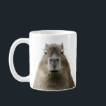 Drôle et mignonne expression de la mug de capybara<br><div class="desc">Commencez votre journée avec un sourire ! Cette tasse présente l'expression faciale d'un adorable capybara d'un regard ennuyeux et impoli, parfait pour les amoureux des animaux avec le sens de l'humour. Ajoutez ou supprimez tout texte personnalisable comme vous le souhaitez. Cette tasse de capybara est là pour détourner l'attention !...</div>