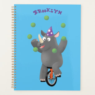 Drôle rhinocéros mignon jonglant sur monocycle