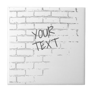 DROOG WIT BRICK WALL MET GRAFFITI. PERSOONLIJK TEGELTJE