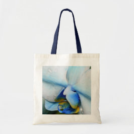 Druppels op blauwe orchidee tote bag