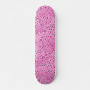 Druppels voor warm roze water skateboard