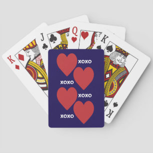Dubbel rood hart en xoxo patroon op blauw pokerkaarten