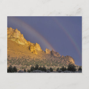 Dubbele regenboog boven een rotsformatie bij Smith Briefkaart