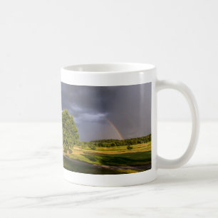 Dubbele regenboog door de Mok van de Regen Koffie