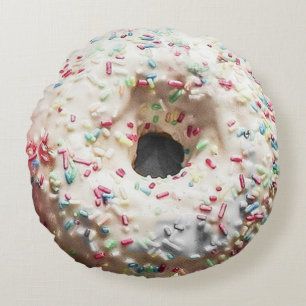 Dubbelzijdige donut: regenboogsprenkels en chocola rond kussen