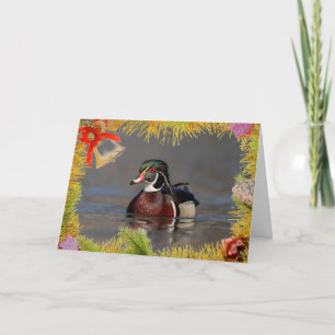 Duck de bois tiré sur une carte de Noël