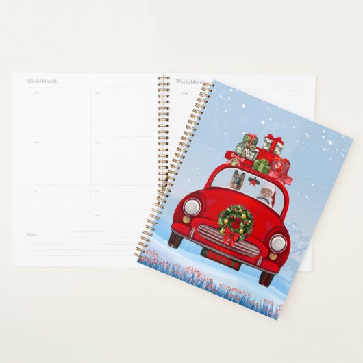 Duitse herderhond in auto met kerstman planner (Display)