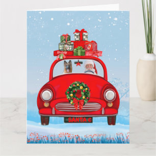 Duitse Herdershond in auto met kerstman Kaart