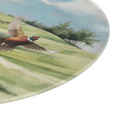 Duitse kortharige pointer die naar een fazant wijs snijplank (Hoek)