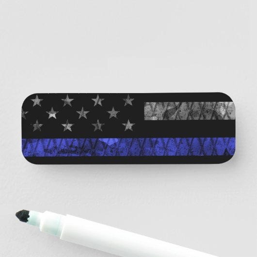 Dun blauwe lijnvlag van politie naamplaatje (In situ)