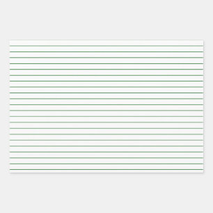 Dunne groene strepen op witte feestjes of kerstmis inpakpapier vel