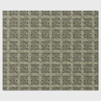 E - monogram in reliëfdruk (goud) cadeaupapier