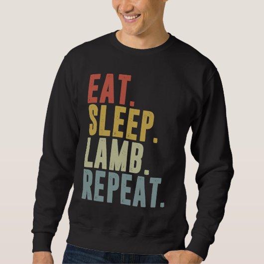 Eat Sleep Lamb Repeat  Lambing Trui (Voorkant)