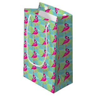 Eau flamand rose et sacs cadeaux motifs de palme