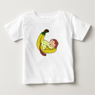 Een aap die slaapt in de pyjama