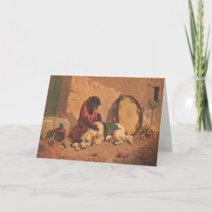 Een aap en een hond met een grote tamboerijn kaart