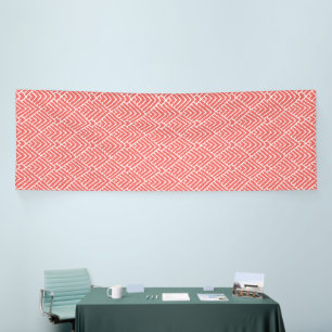 Een afbeelding met een rood-wit patroon, prominent spandoek