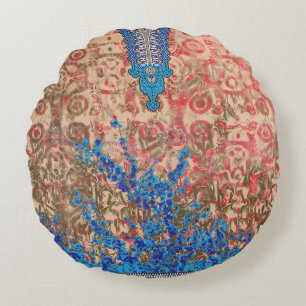 Een afbeelding van een blauw en beige sjaal rond kussen