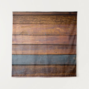 Een antiek houten wandachtergrond met metaal wandkleed