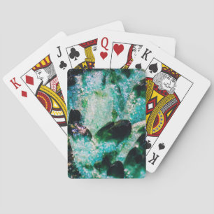 Een aura van smaragden pokerkaarten