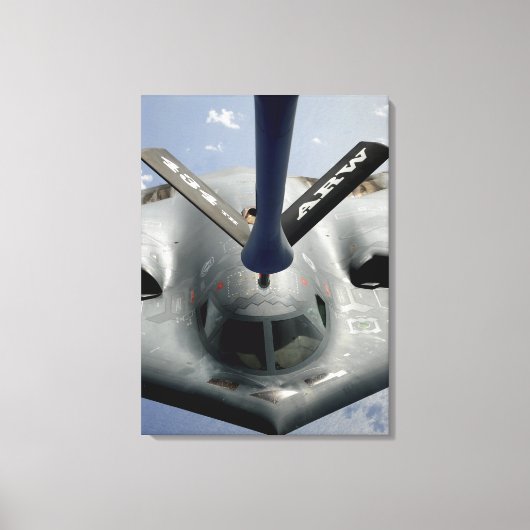 Een B-2-gedistilleerd vliegtuig in positie Canvas Afdruk (Voorkant)