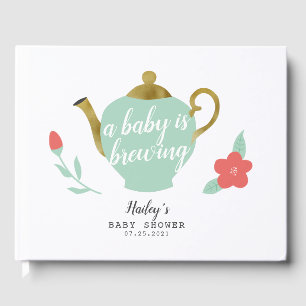 Een Baby is bezig met het brouwen van Gold Tea Par Gastenboek
