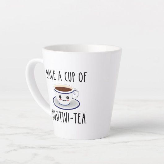 Een beker met positieve thee latte mok (Linkerhoek)