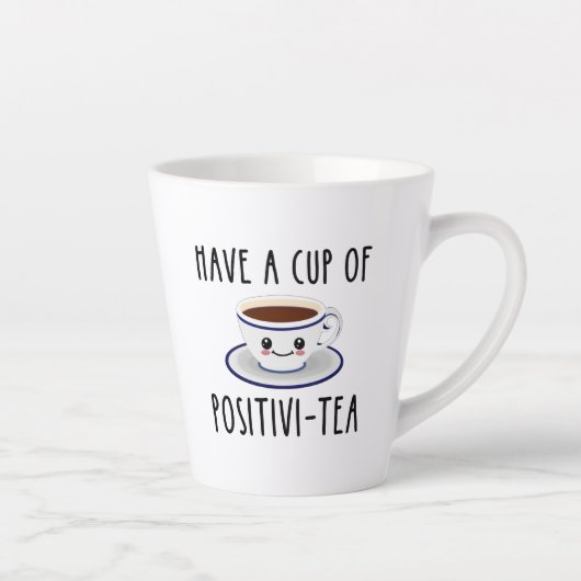 Een beker met positieve thee latte mok (Rechts)