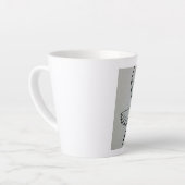 Een beker met vredesduif en schriftuur latte mok (Linkerhoek)