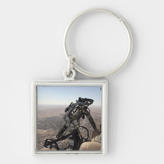 Een bemanningshoofd zoekt verdachte activiteit sleutelhanger (Voorkant)