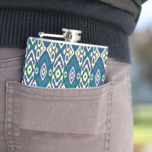 Een blauw en groen patroon met een witte achtergro heupfles