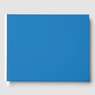 Een blauwe achtergrond met een gastenboek