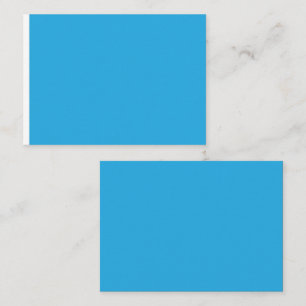 een blauwe achtergrond met een plaatskaartje