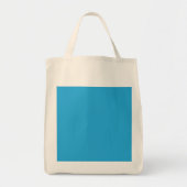 Een blauwe achtergrond met een zwarte en witte kat tote bag (Voorkant)