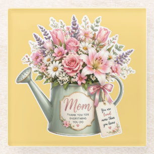 Een boeket bloemen in een gietkan voor mama glazen onderzetter