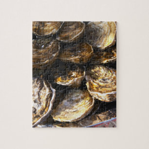 Een bord met oesters. legpuzzel