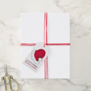 Een cadeautje van de geheime kerstkerstman met de cadeaulabel